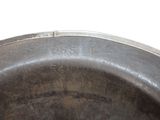 a close up view of a metal pan with a handle