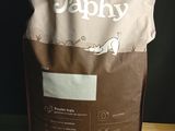 a bag of dog food sitting on a table