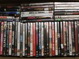 a lot of dvds in a box on the table