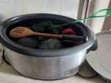 pots and pans are sitting on a counter in a kitchen