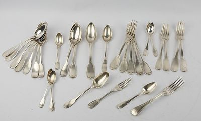 an assortment of silverware including spoons, forks and spoons