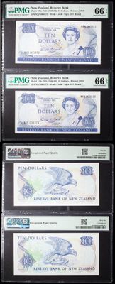 four different bank notes are on display on a black surface