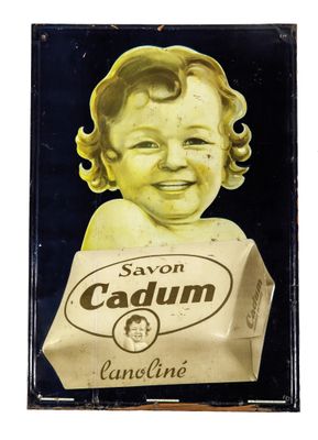 an old sign with a child holding a carton of caulim on it