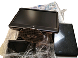 a lot of electronic items that are sitting on a table