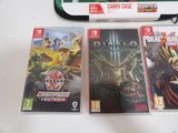 three nintendo wii games on a table next to each other