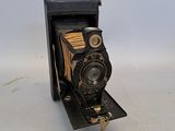 an old camera that is sitting on a table