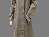 an image of a mannequin dressed in a beige trench coat