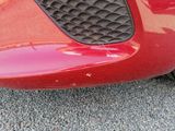 a close up of a car ' s front bumper and grille