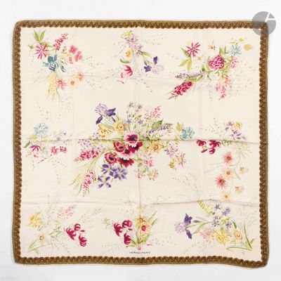 a close up of a floral print handkerchief on a white background