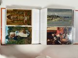 a book open on a white couch with pictures on it