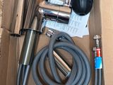 a box that has a hose and a hose in it