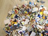 a pile of assorted items sitting on the floor