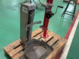 a machine that is sitting on a pallet in a warehouse