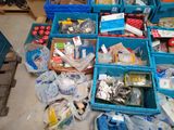 boxes of assorted items are sitting on the floor in a room