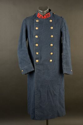 a blue military coat with gold buttons and a red collar