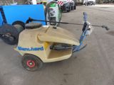 an image of a small cart with a hose attached to it