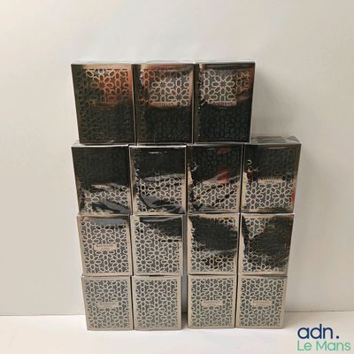 a stack of six boxes of cigarettes sitting on a table