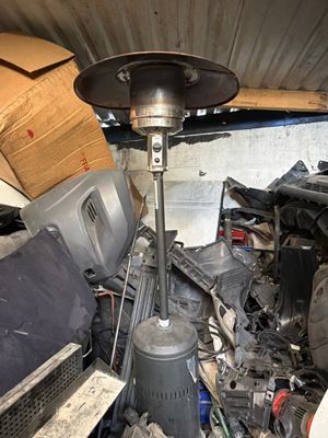 a large pile of junk in the back of a truck