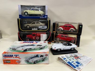 a lot of assorted toy cars on a table