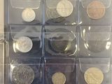 a display case with a lot of coins in it