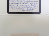 a piece of paper with writing on it and a piece of paper with writing on it
