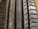 a close up of a tire on a cardboard box