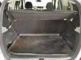 a trunk of a car with the back seats folded down
