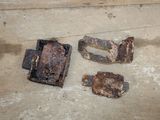 two pieces of rust on the floor next to each other