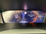 the dashboard of a car with a digital display on it ' s dashboard