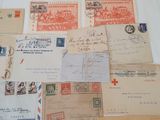 many different types of letters and envelopes laid out on a table