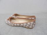 women ' s ballet shoes with a bow on the toe