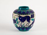 a blue vase with a horse on it on a white background