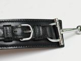 a black leather belt with a metal buckle on it