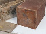two wooden boxes sitting next to each other on the floor
