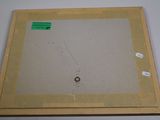 an old picture of a piece of paper with a hole in it