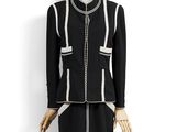 une robe et une veste noires et blanches sur un mannequin