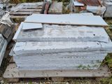 a pile of concrete blocks sitting on a pallet