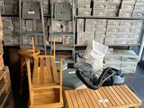 two wooden chairs and a table in a room