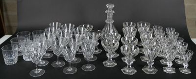 a lot of wine glasses sitting on a table