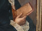 painting of a man holding a book in his right hand