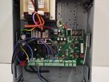 a close up of an electronic device with wires and wires attached to it