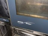 an oven that has a lot of cooking utensils inside of it
