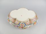 a white bowl with a floral design on it