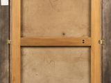 an old picture of a wooden frame with a picture in it