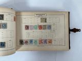 a book with a bunch of stamps on it