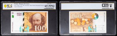 three different types of currency are on display in a display case