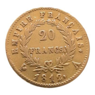 une image représentant une pièce d'or sur laquelle figure le chiffre vingt
