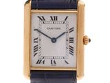 a close up of a wrist watch with roman numerals on it