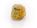 yellow diamond on a white surface with a white background
