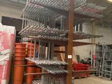 a picture of a rack of pipes in a warehouse